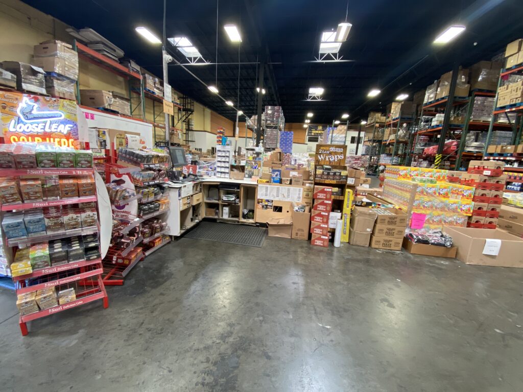 Sales floor area with checkout counter and product displays